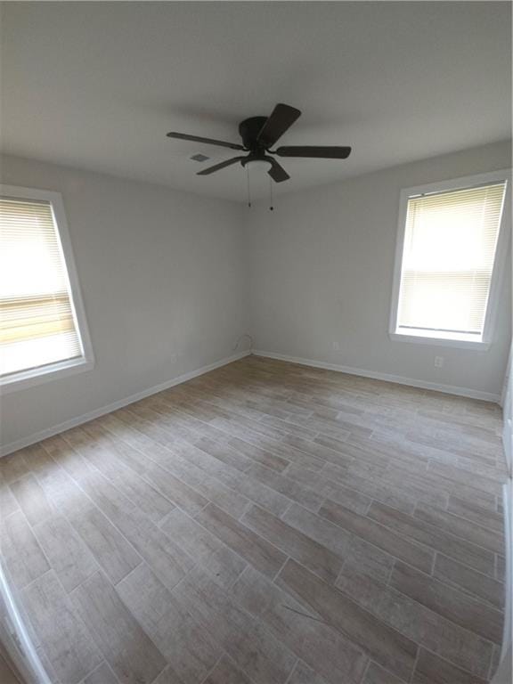 644 Magnolia Dr, La Place, LA 70068 - empty room with baseboards, a ceiling fan, and wood finished floors