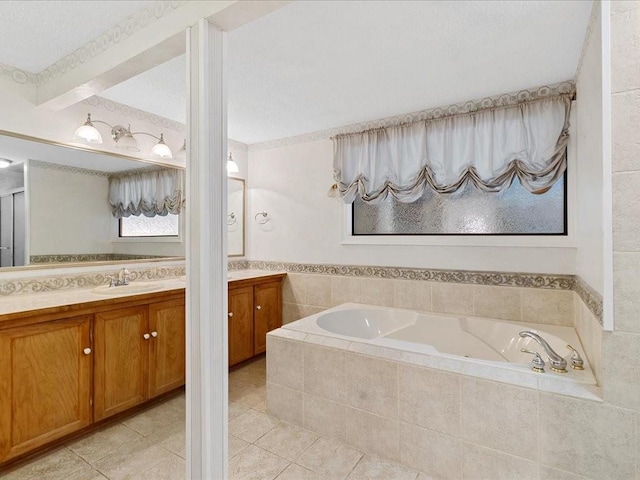 full bath with vanity, tile patterned floors, and a bath