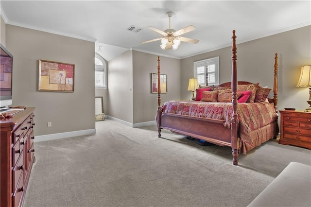 bedroom with visible vents, multiple windows, baseboards, and ornamental molding