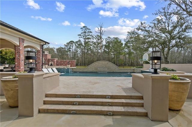 pool with a patio