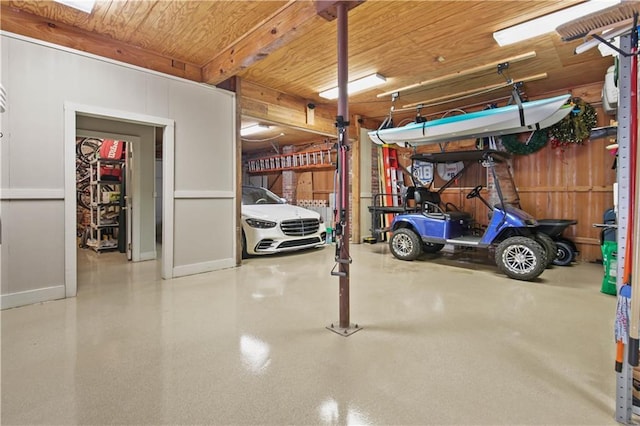 garage featuring wood ceiling