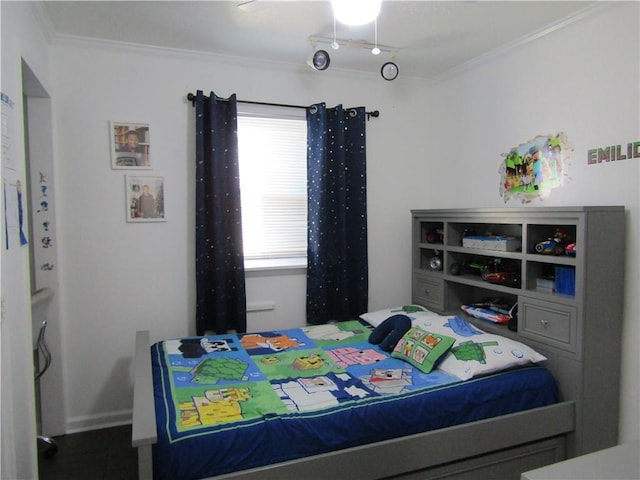 bedroom with crown molding