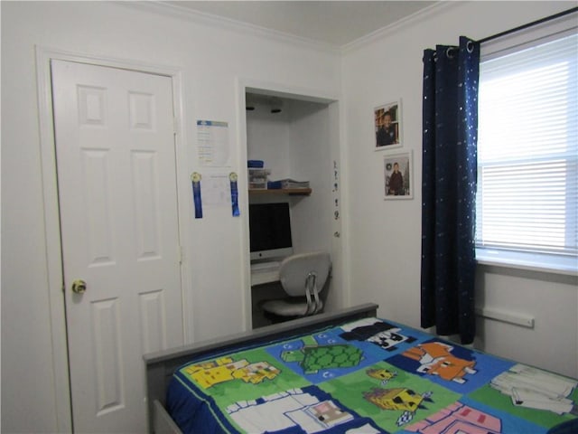 bedroom with crown molding