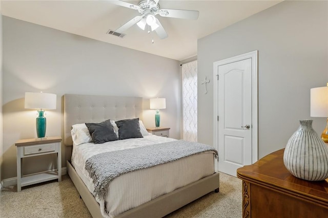 bedroom featuring visible vents, carpet flooring, and a ceiling fan