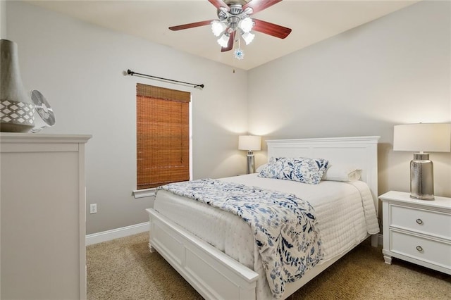 bedroom featuring baseboards, carpet, and ceiling fan