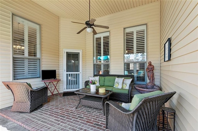 view of patio with outdoor lounge area and a ceiling fan