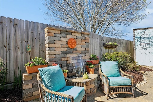 view of patio / terrace with a fenced backyard