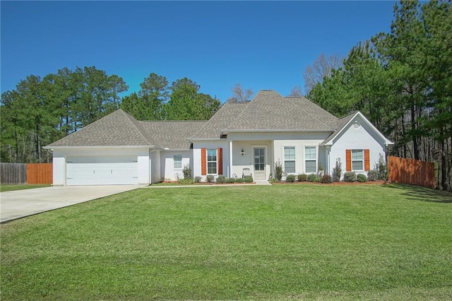 ranch-style home featuring a front lawn, an attached garage, driveway, and fence