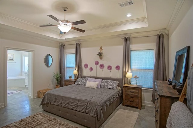 bedroom featuring a tray ceiling, baseboards, visible vents, and ornamental molding