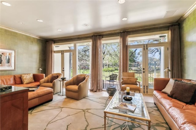 living room featuring french doors and ornamental molding