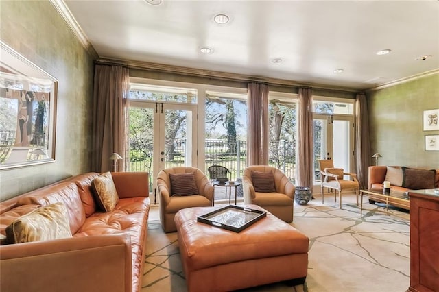 living area with plenty of natural light, french doors, and crown molding