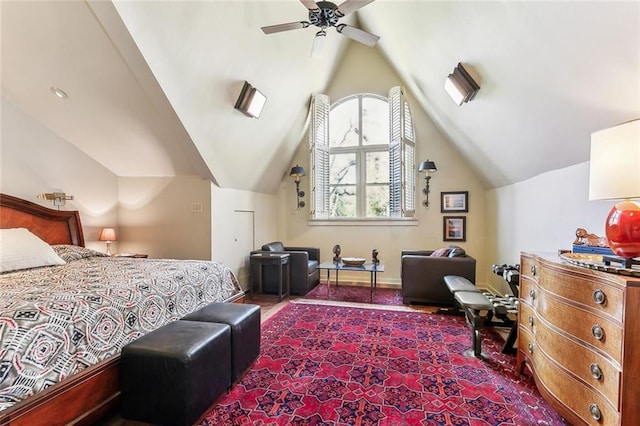 carpeted bedroom with a ceiling fan, baseboards, and vaulted ceiling