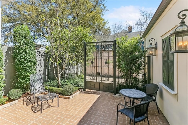 view of patio / terrace with fence