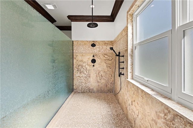 full bathroom with visible vents, a healthy amount of sunlight, ornamental molding, and a tile shower