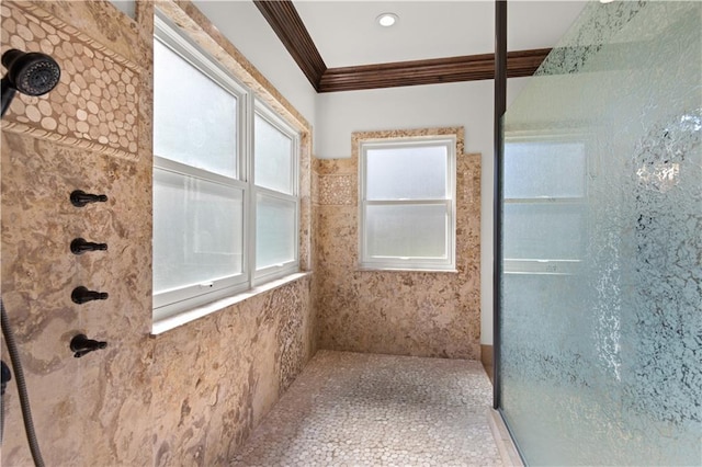 full bathroom with tiled shower and crown molding