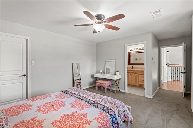 carpeted bedroom featuring baseboards, visible vents, and ceiling fan