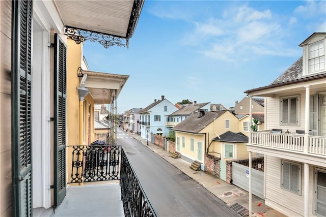 balcony featuring a residential view