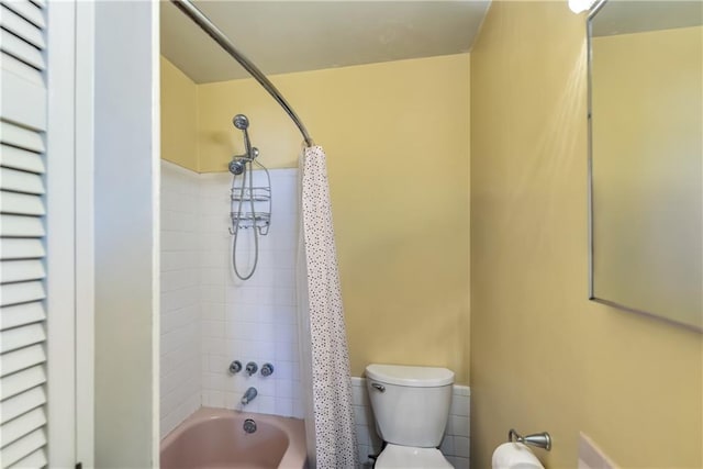 full bathroom with toilet and shower / bath combo