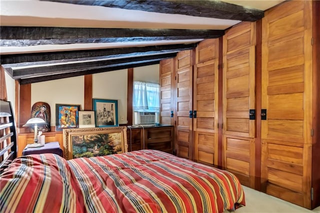 bedroom with cooling unit and vaulted ceiling with beams