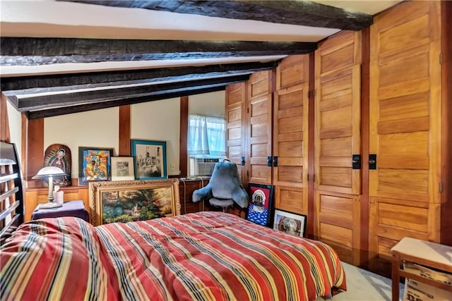 bedroom featuring carpet flooring, cooling unit, and lofted ceiling with beams