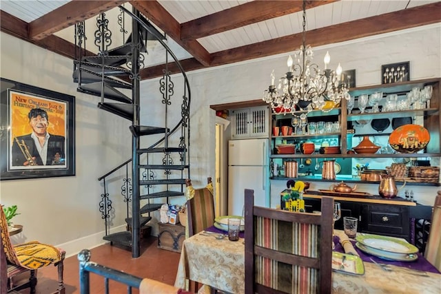 dining space with beamed ceiling, baseboards, a chandelier, and stairs