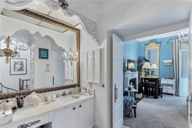 full bathroom featuring ornamental molding and vanity