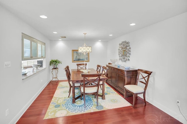 dining area featuring visible vents, recessed lighting, wood finished floors, and baseboards