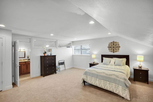 bedroom with recessed lighting, light colored carpet, baseboards, and vaulted ceiling