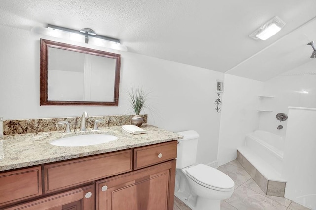 bathroom featuring vanity, lofted ceiling,  shower combination, a textured ceiling, and toilet