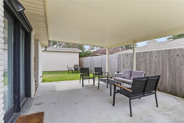 view of patio with an outdoor living space, a storage shed, an outdoor structure, and fence