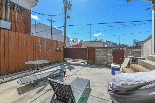 view of patio with fence