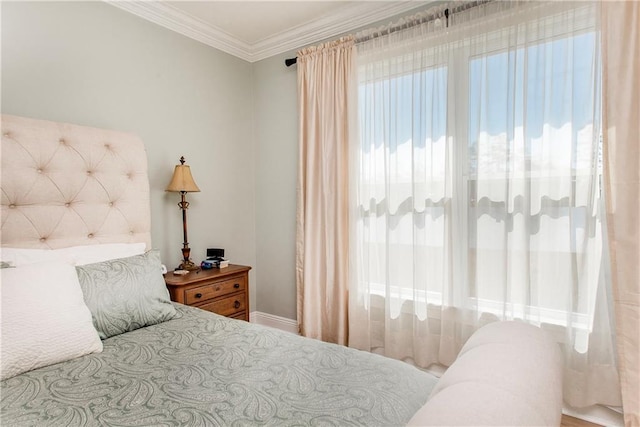 bedroom with crown molding