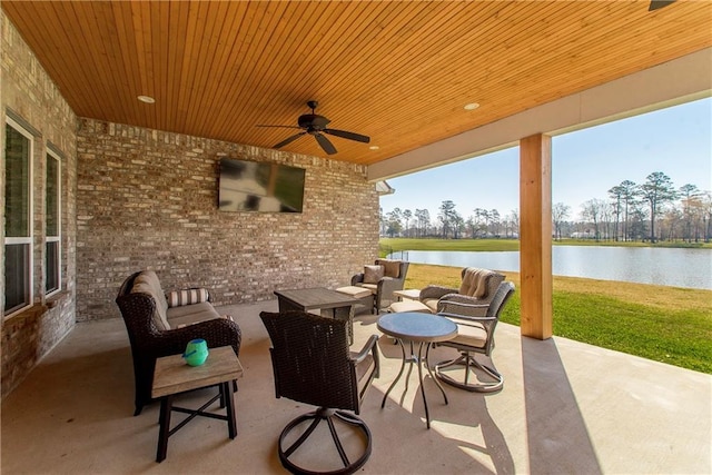 view of patio featuring outdoor lounge area and ceiling fan