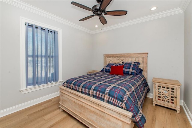 bedroom with crown molding, recessed lighting, wood finished floors, and baseboards