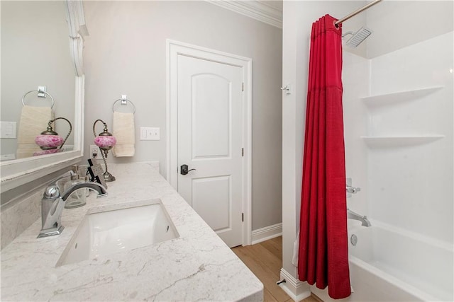 bathroom with wood finished floors, vanity, and shower / bath combination with curtain