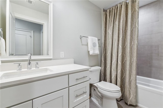 full bathroom with vanity, shower / tub combo, toilet, and visible vents