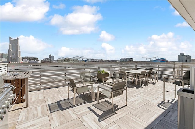 wooden deck with a city view