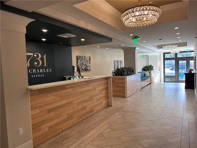 reception area featuring a notable chandelier