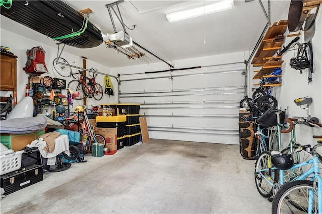 garage featuring a garage door opener