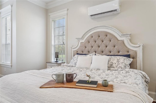 bedroom featuring crown molding and a wall mounted AC