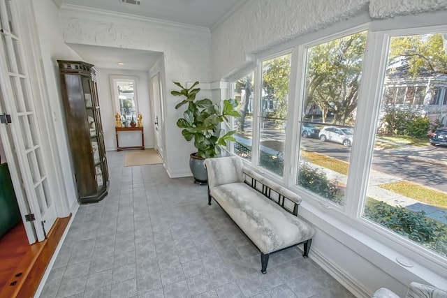 sunroom featuring visible vents