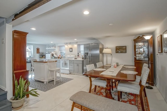 dining area featuring recessed lighting