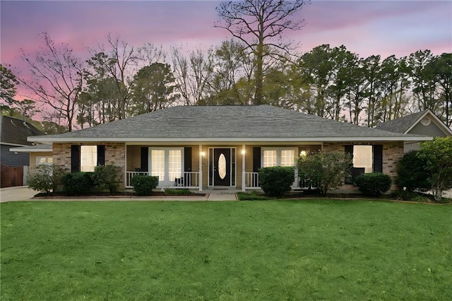 105 Oak Leaf Dr, Slidell, LA 70461 - ranch-style house with a lawn, covered porch, and concrete driveway