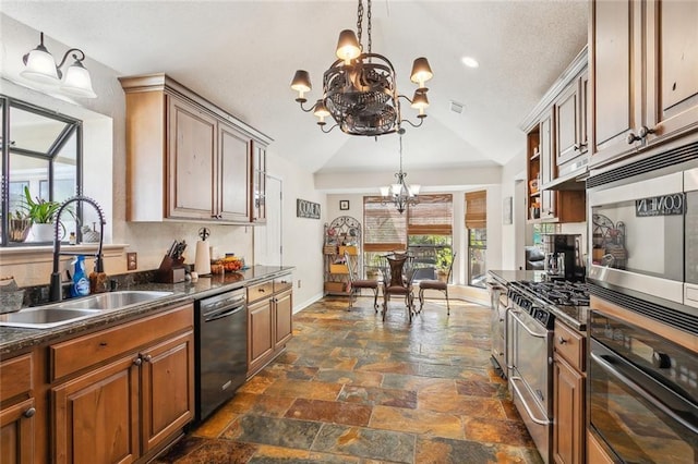 kitchen featuring black appliances, dark countertops, a chandelier, and a sink