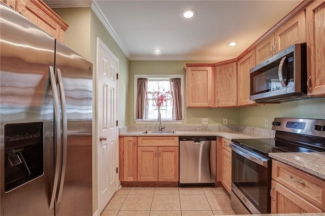 kitchen featuring ornamental molding, a sink, recessed lighting, appliances with stainless steel finishes, and light tile patterned floors