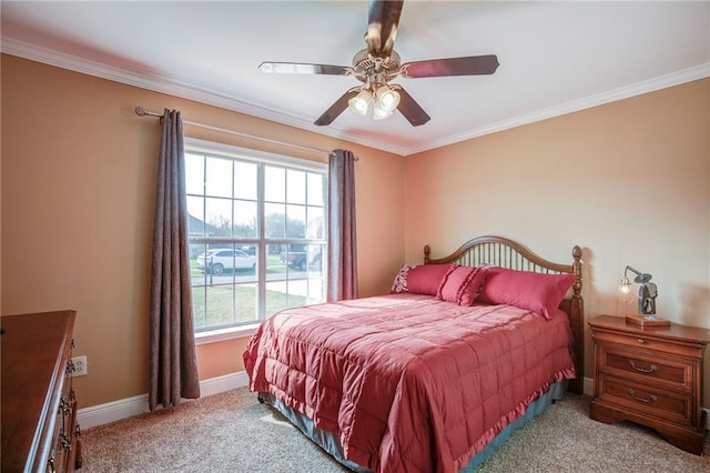 bedroom featuring crown molding, light colored carpet, baseboards, and ceiling fan