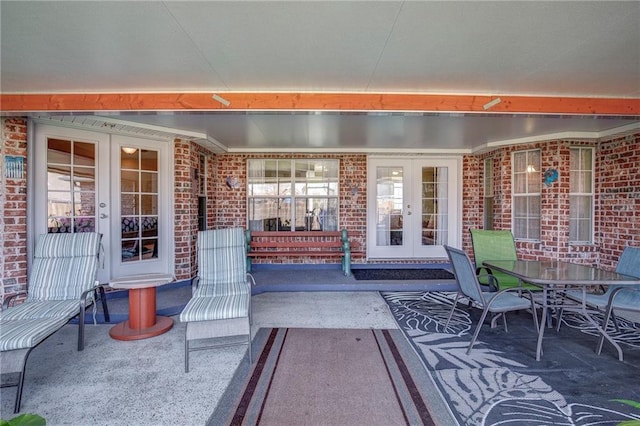 view of patio / terrace featuring outdoor dining space and french doors