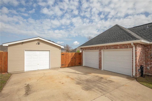 garage with fence