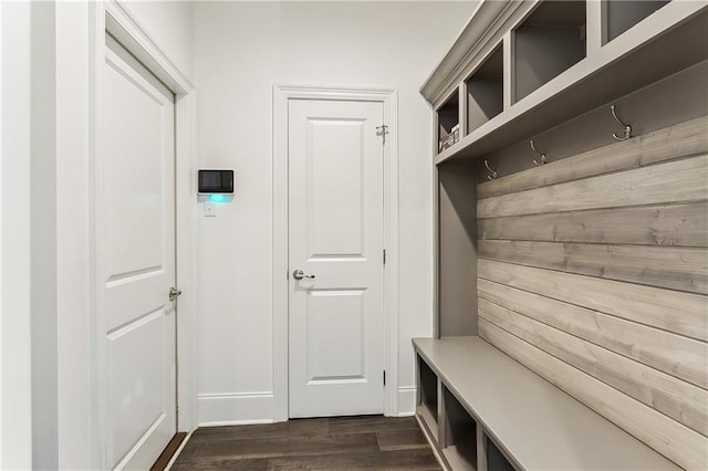 mudroom with dark wood-style floors