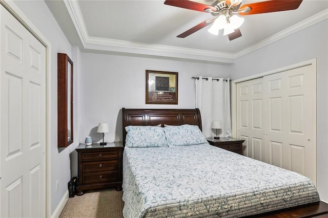 bedroom featuring a closet, crown molding, baseboards, and carpet floors